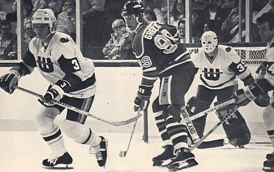Brad Selwood and Cap Raeder keep an eye on a young Wayne Gretzky