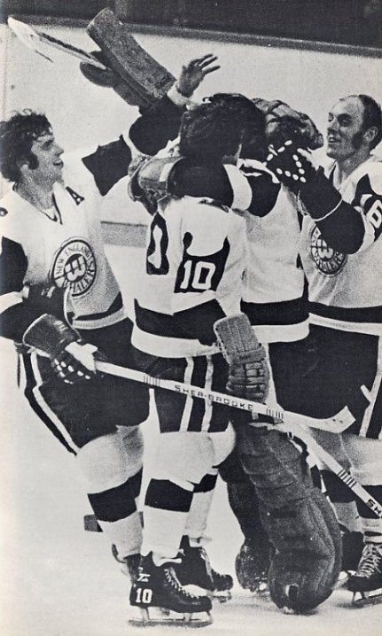 Dick Sarrazin, Jim Dorey, and Larry Pleau congratulate Al Smith on a win
