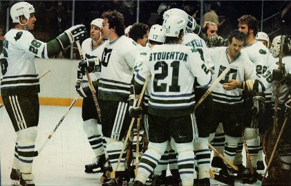 Don Nachbaur, Al Sims, Rick MacLeish, Blaine Stoughont, Dave Keon and the rest of the Whalers celebrate a win