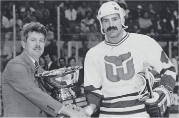 Dave Babych accepts the 1989 Budweiser Most Valuable Defenseman award