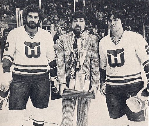 Larry Giroux and Pat Boutette accept the 1980 Frank Keyes Memorial Unsung Hero award