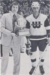 Tom Webster accepts the 1976 Irish Spring Three Star award