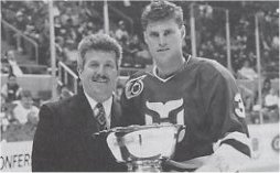 Zarley Zalapski accepts the 1992 Budweiser Most Valuable Defenseman award